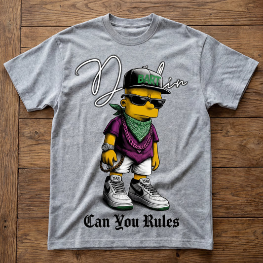 Gray t-shirt with a cartoon character and text on a wooden surface